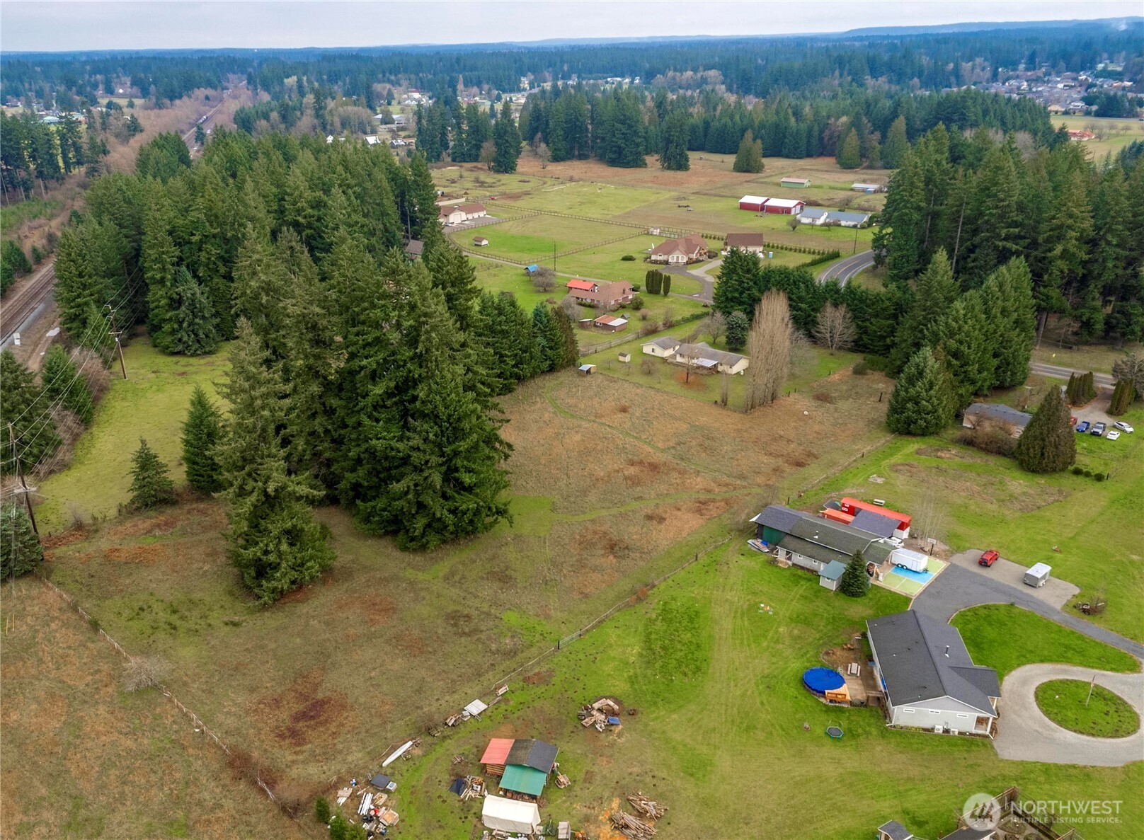 9405 Rich Road Southeast Olympia, WA 98501 - Photo 20 of 25 an aerial view of residential houses with outdoor space