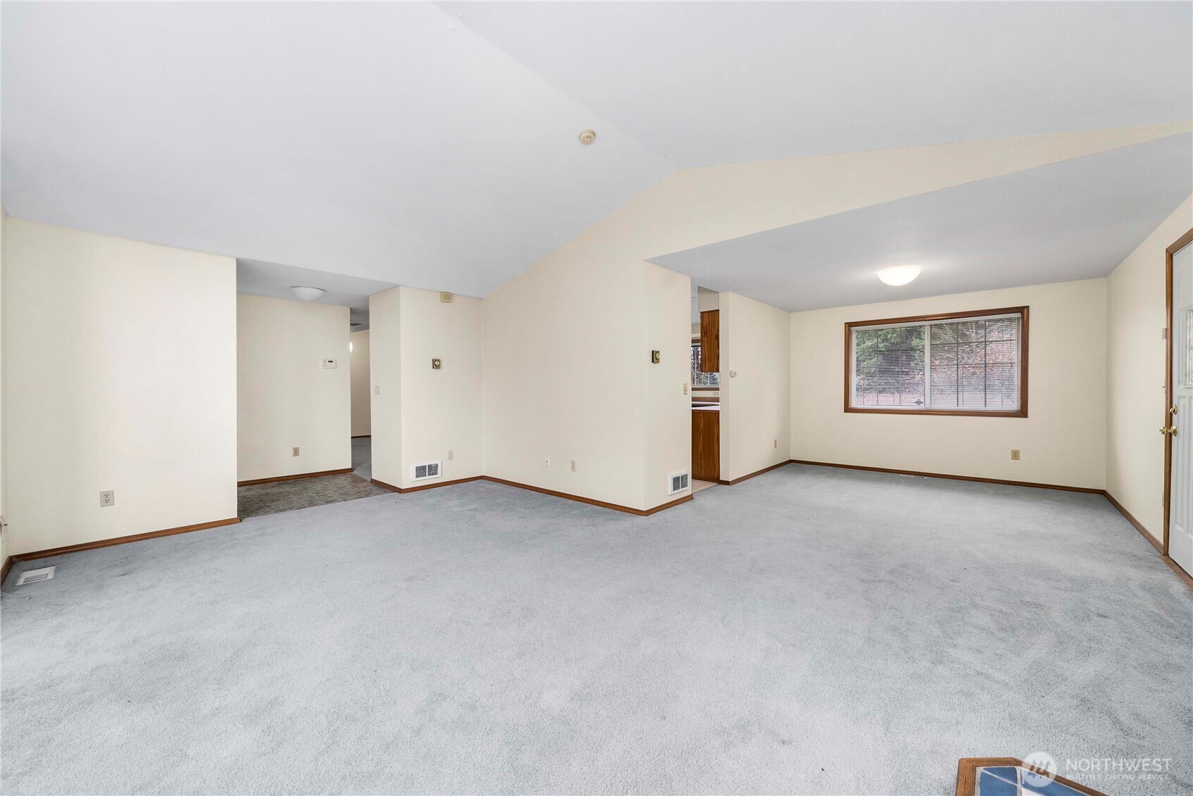 9405 Rich Road Southeast Olympia, WA 98501 - Photo 3 of 25 a view of an empty room with a windows