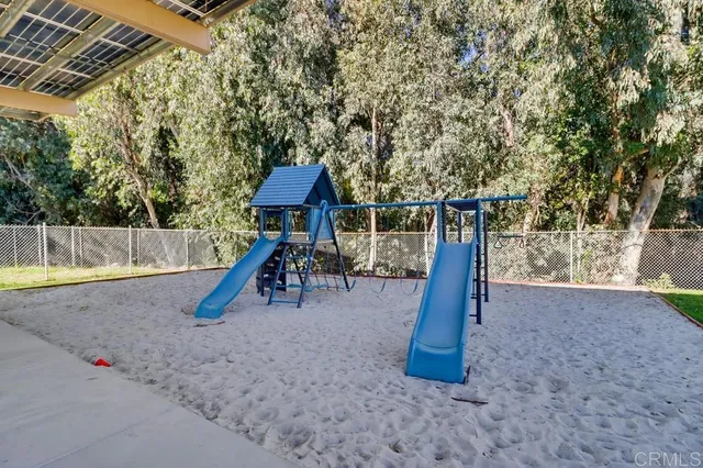 a view of outdoor space with a slide