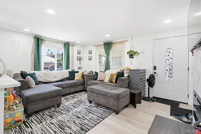 a living room with furniture and a couch