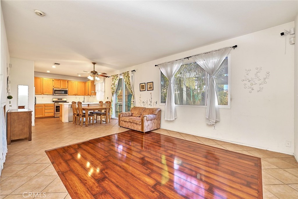 7371 Correspondence Place Rancho Cucamonga, CA 91730 - Photo 11 of 39 a lobby with furniture and a wooden floor