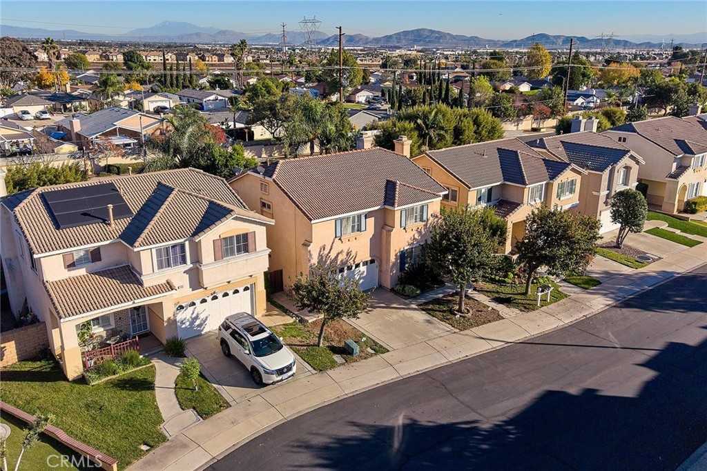 7371 Correspondence Place Rancho Cucamonga, CA 91730 - Photo 4 of 39 an aerial view of multiple houses with yard