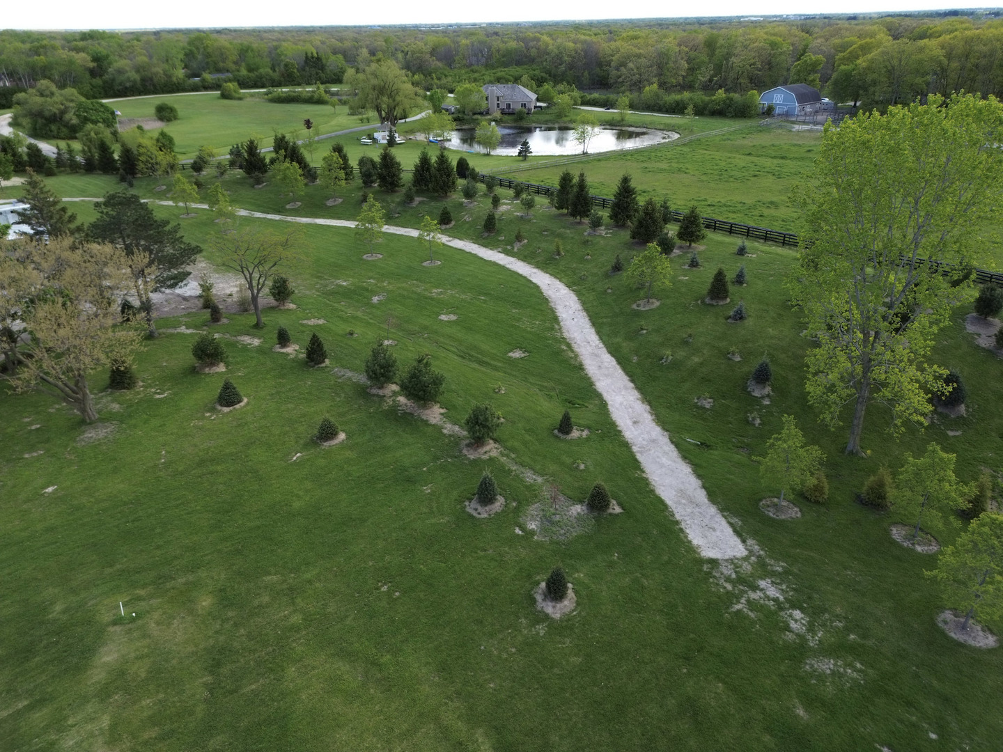 14341 West Old School Road Libertyville, IL 60048 - Photo 23 of 24 a view of a green field with lots of trees