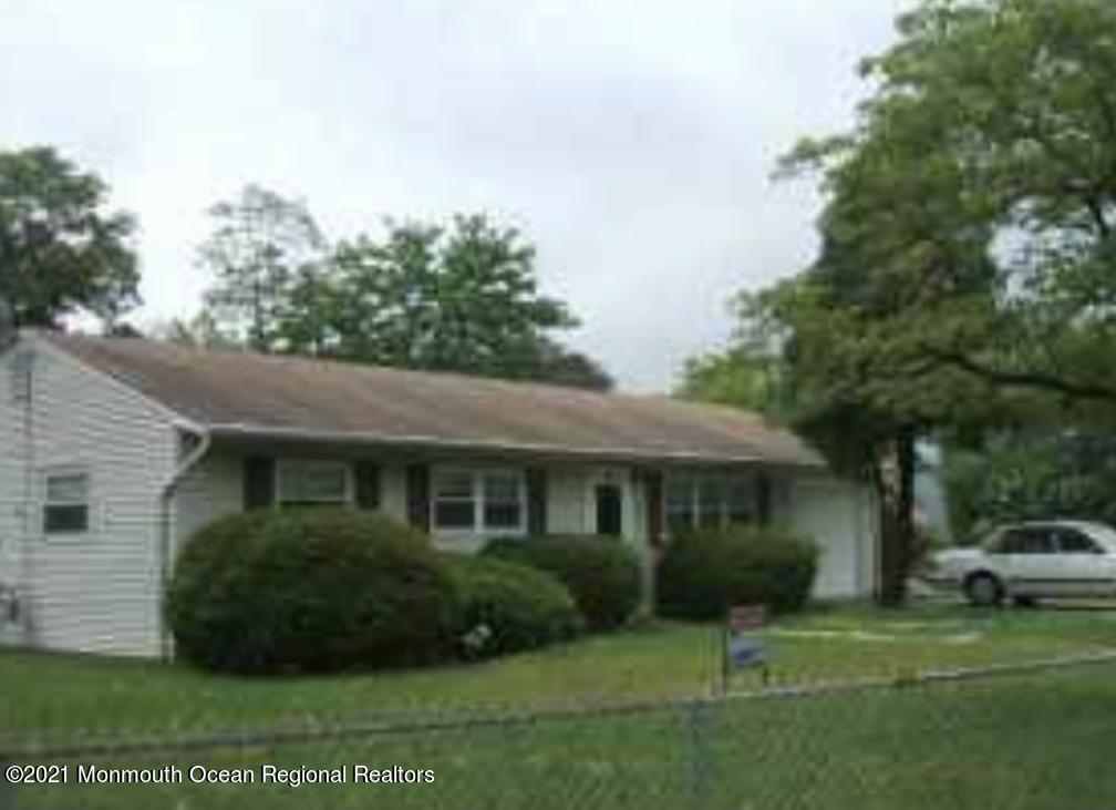 412 Dover Road Toms River, NJ 08757 - Photo 2 of 2 a front view of a house with a yard and trees