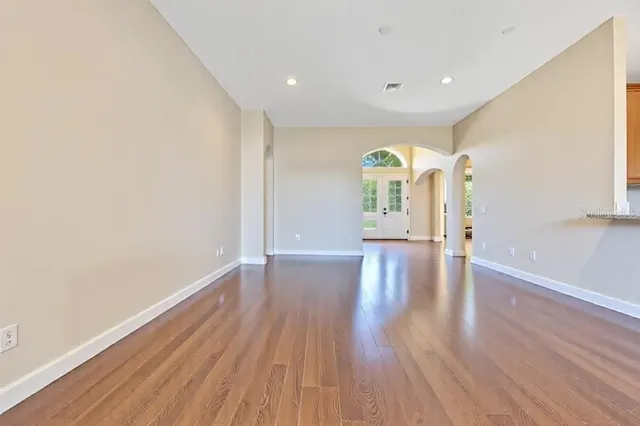 a kitchen with stainless steel appliances granite countertop a stove microwave and sink