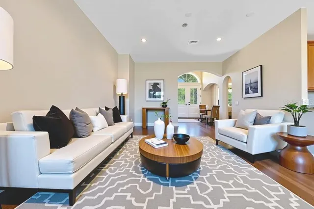 a bathroom with a granite countertop sink and mirror