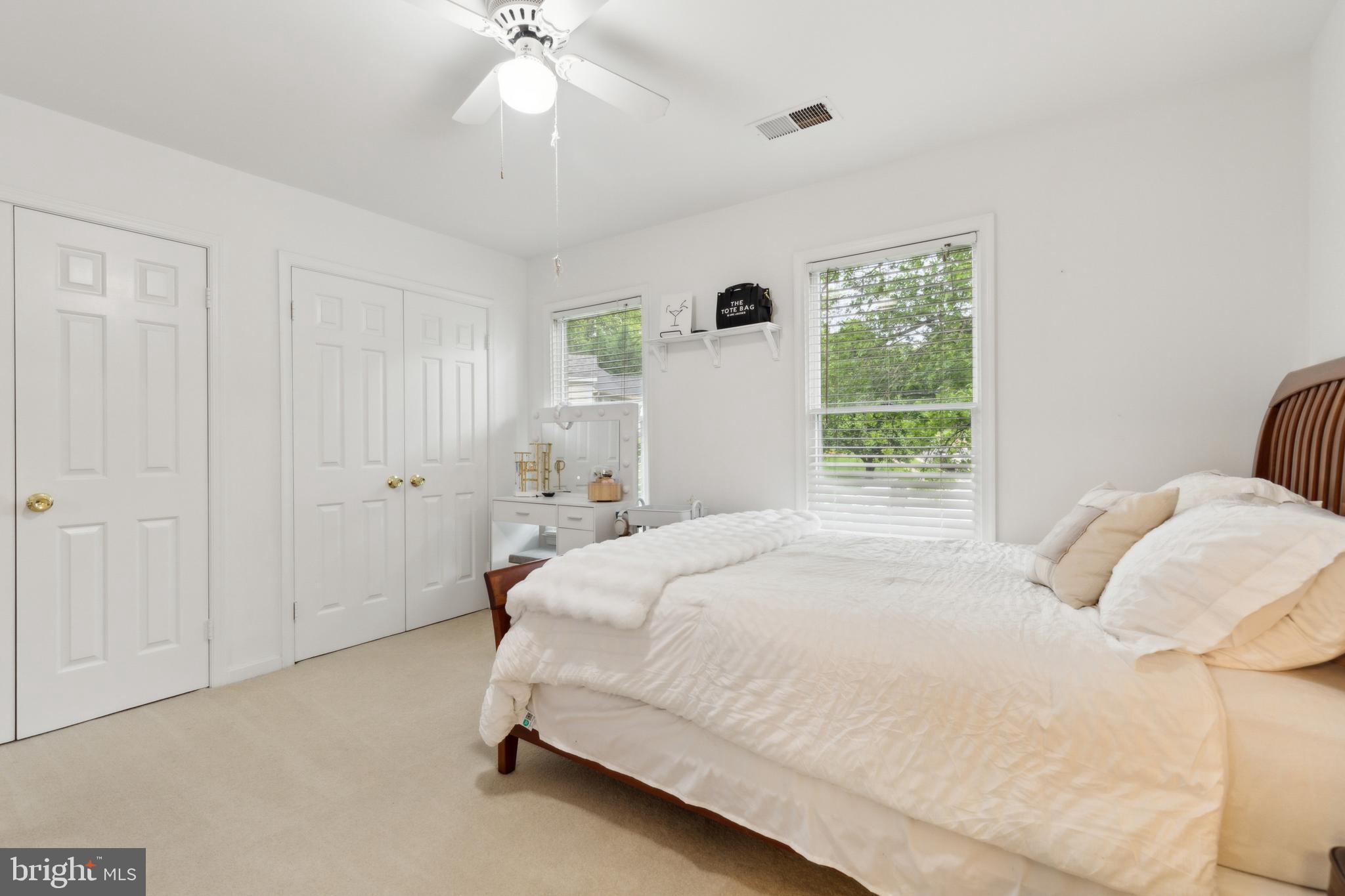 6724 Passageway Place Burke, VA 22015 - Photo 17 of 26 a bedroom with a bed and window