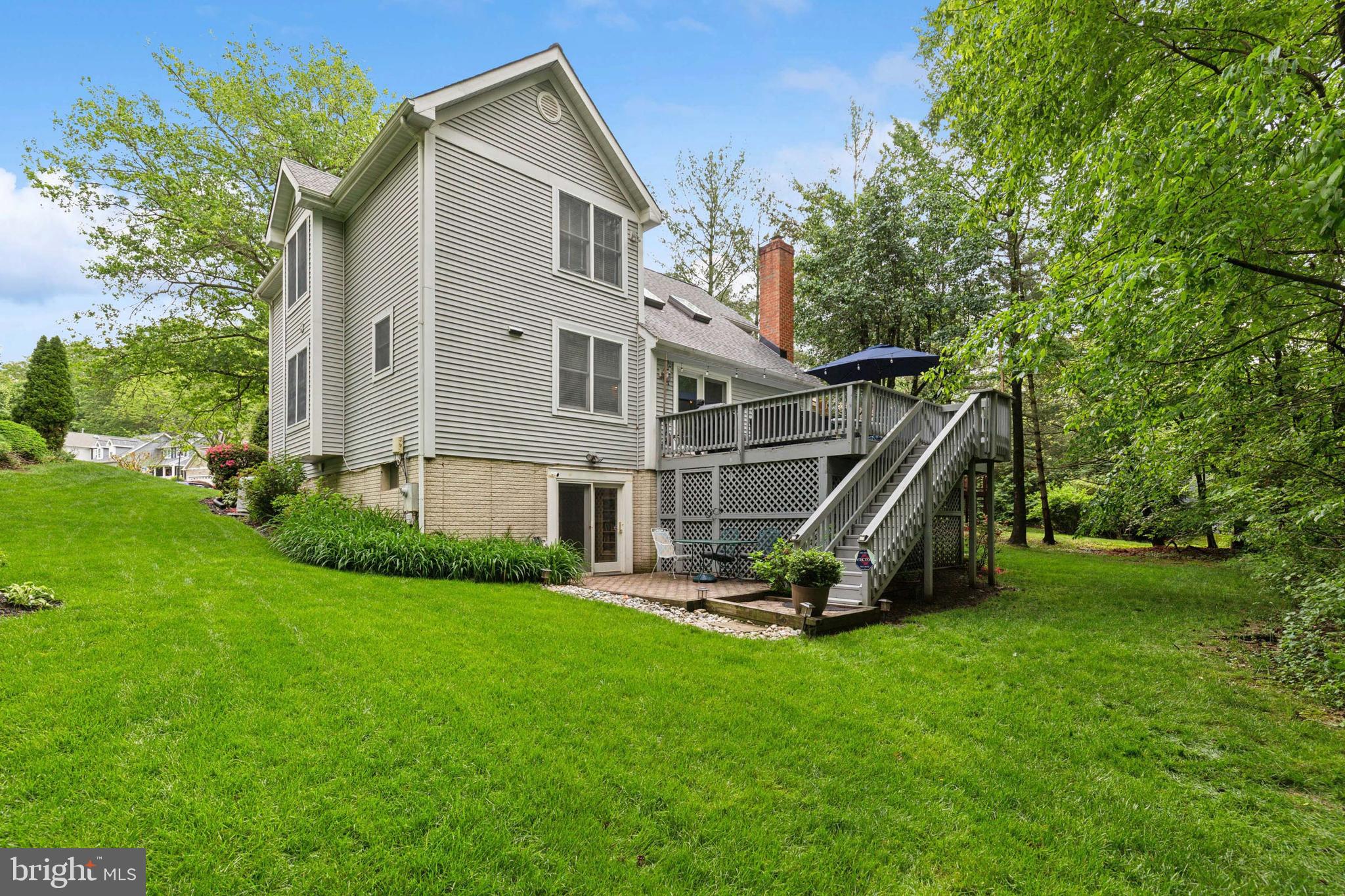 6724 Passageway Place Burke, VA 22015 - Photo 25 of 26 a view of a house with backyard