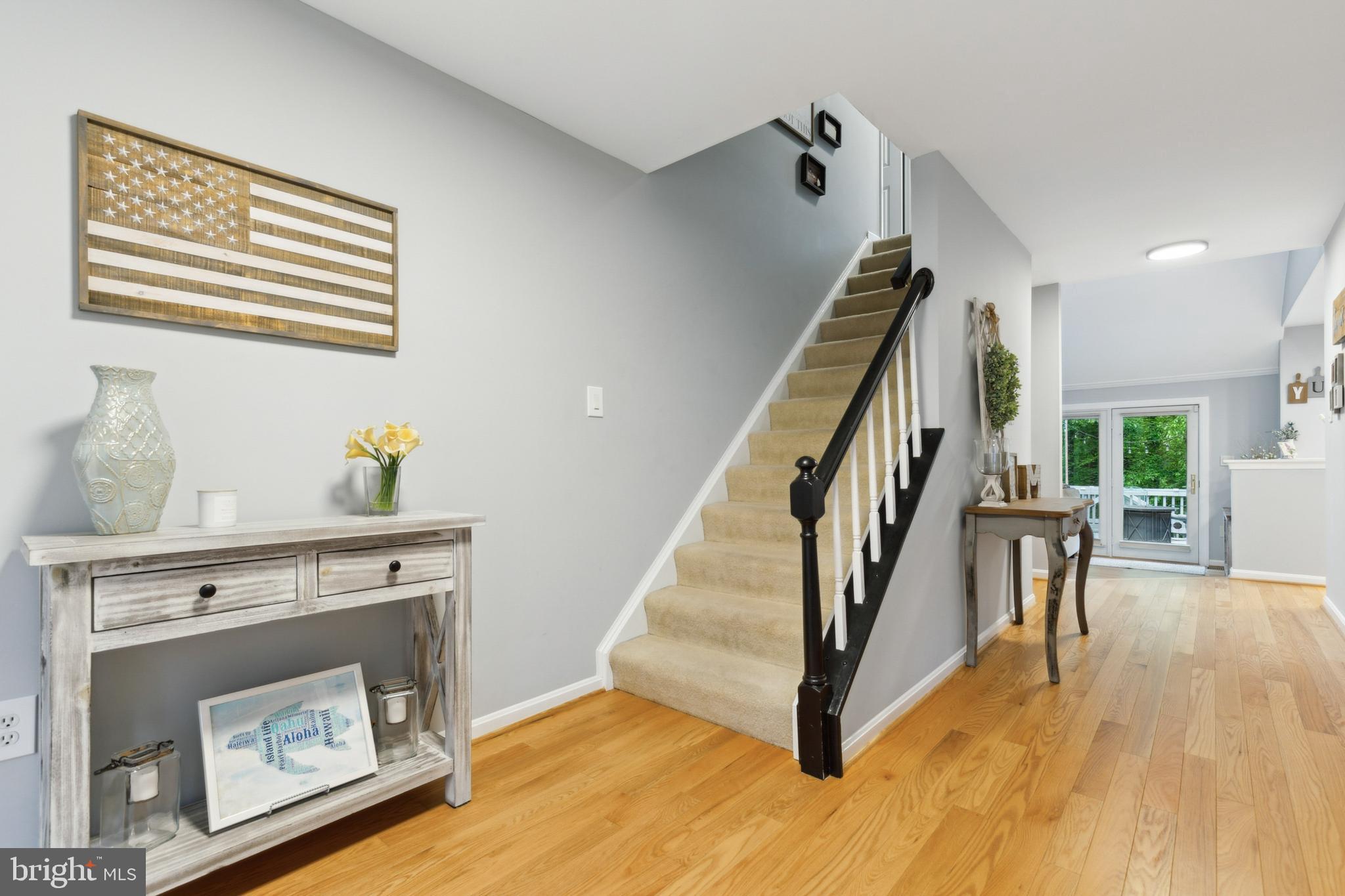 6724 Passageway Place Burke, VA 22015 - Photo 3 of 26 a view of an entryway with wooden floor