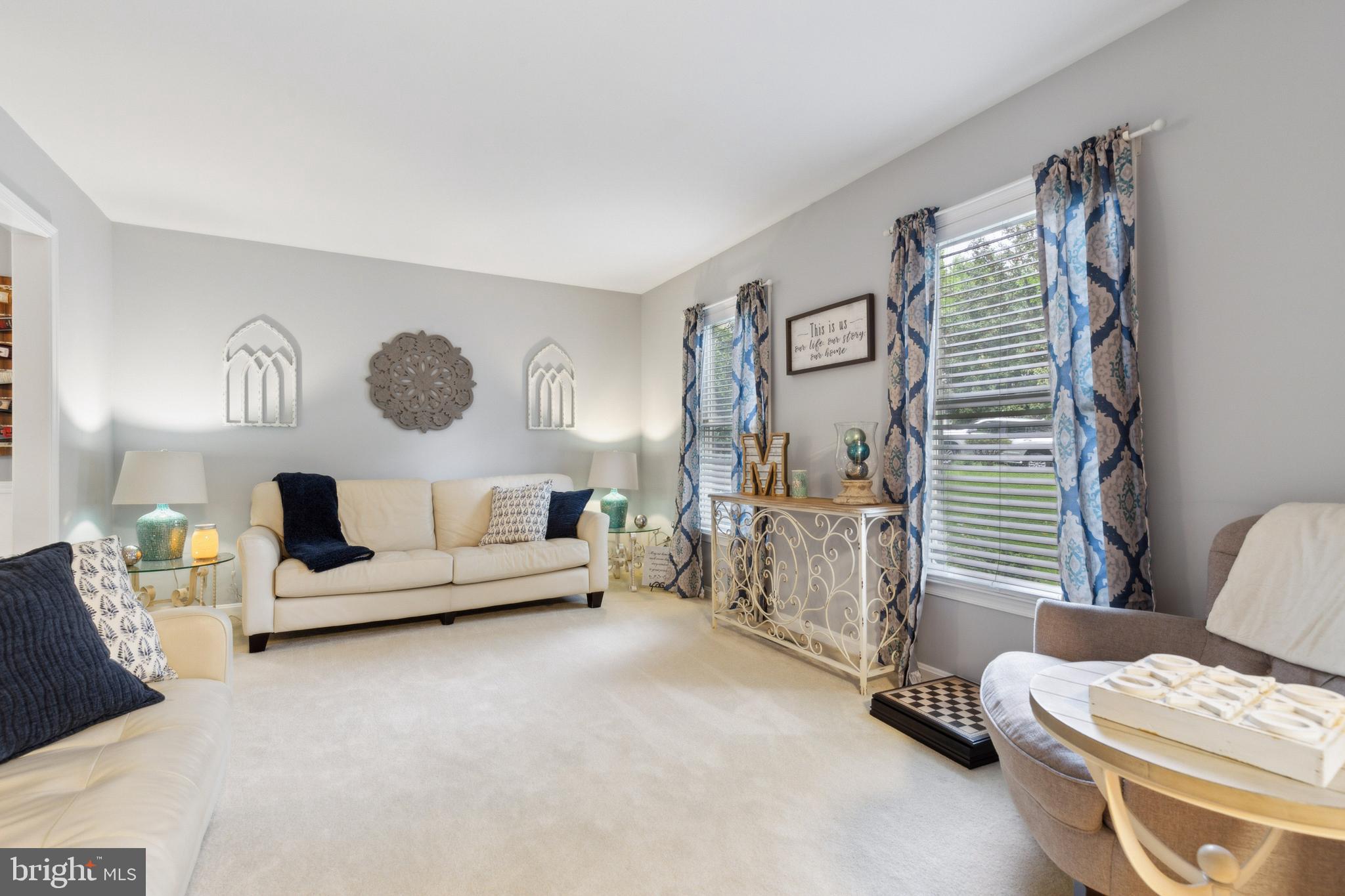 6724 Passageway Place Burke, VA 22015 - Photo 4 of 26 a living room with furniture and a window