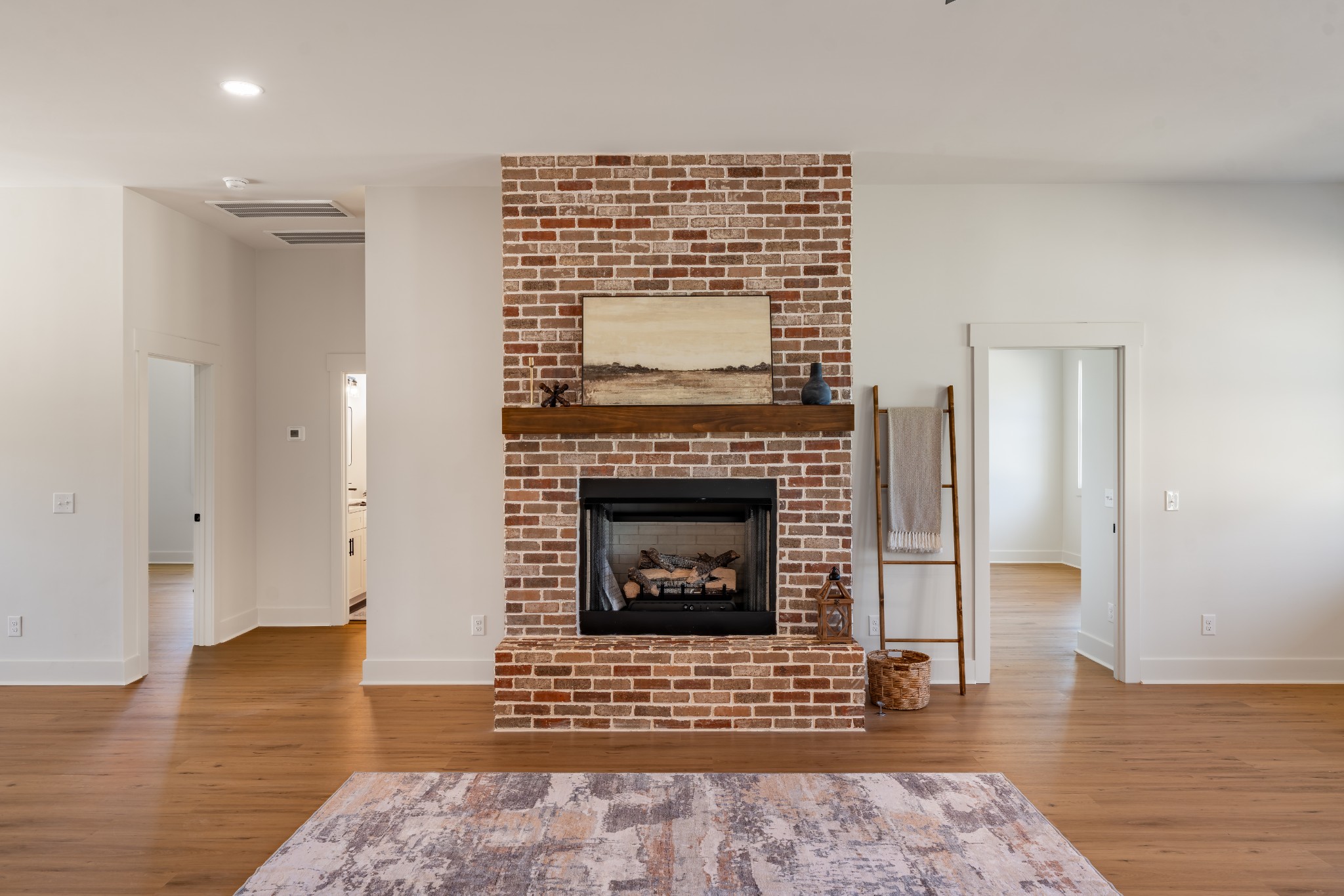4031 Wells Road Springfield, TN 37172 - Photo 7 of 39 a view of an empty room with glass door and fire place