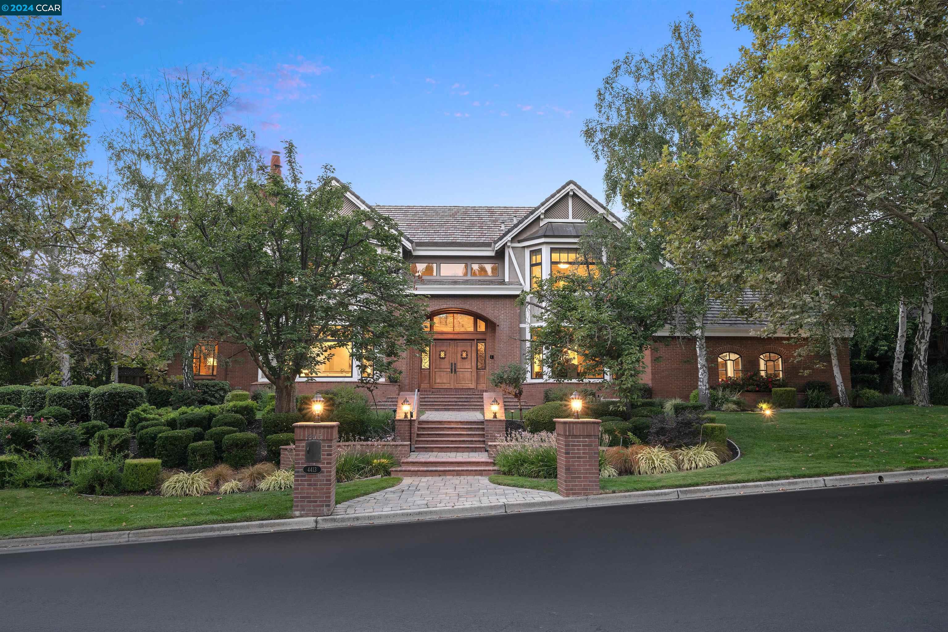 front view of a house with a street