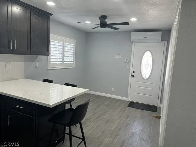 a very nice looking room with wooden floor