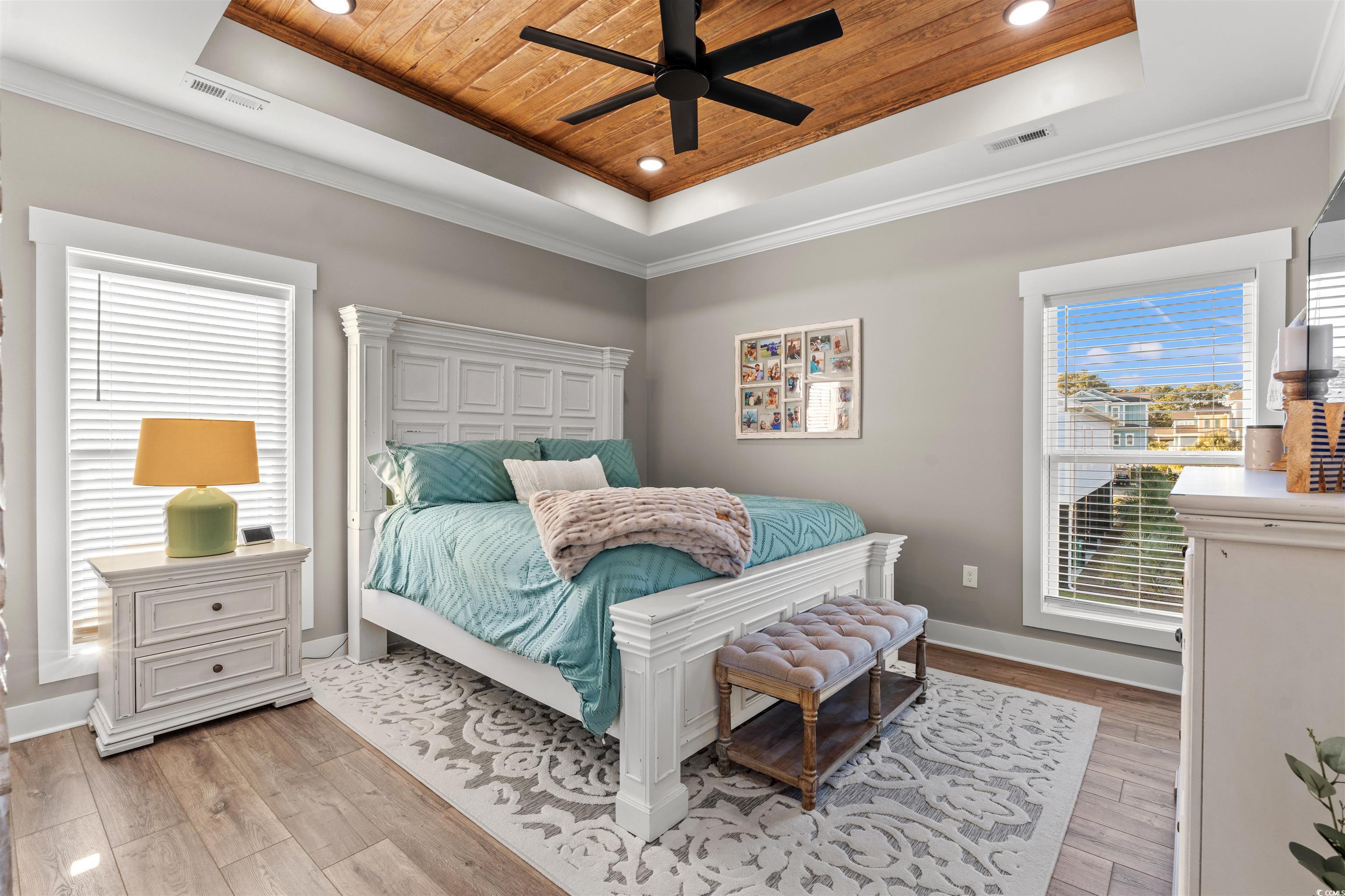 355 Oak Avenue Murrells Inlet, SC 29576 - Photo 18 of 34 Bedroom featuring a tray ceiling, baseboards, visible vents, and wooden ceiling