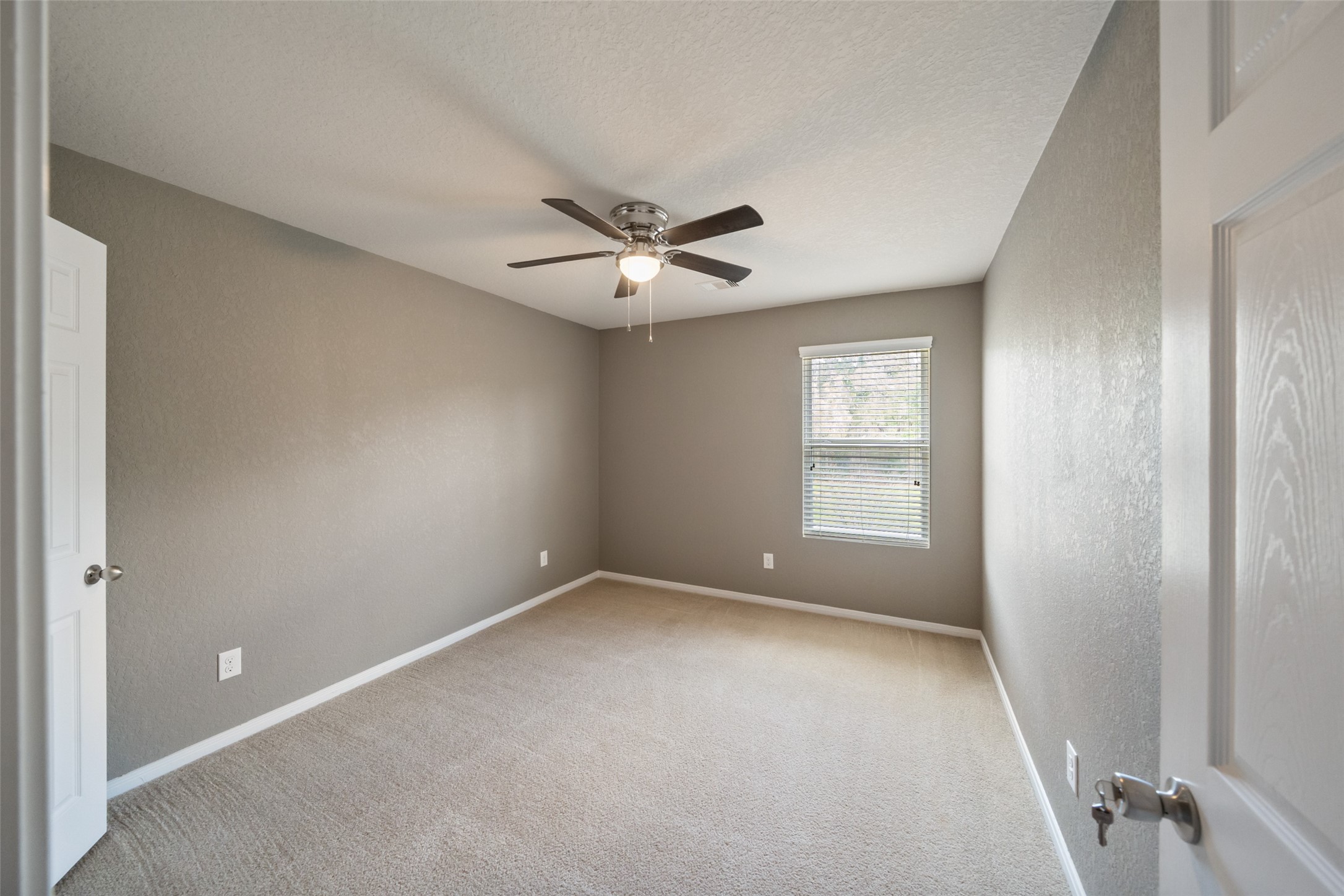 28915 Birch Green Way Spring, TX 77386 - Photo 18 of 30 a view of an empty room with a window