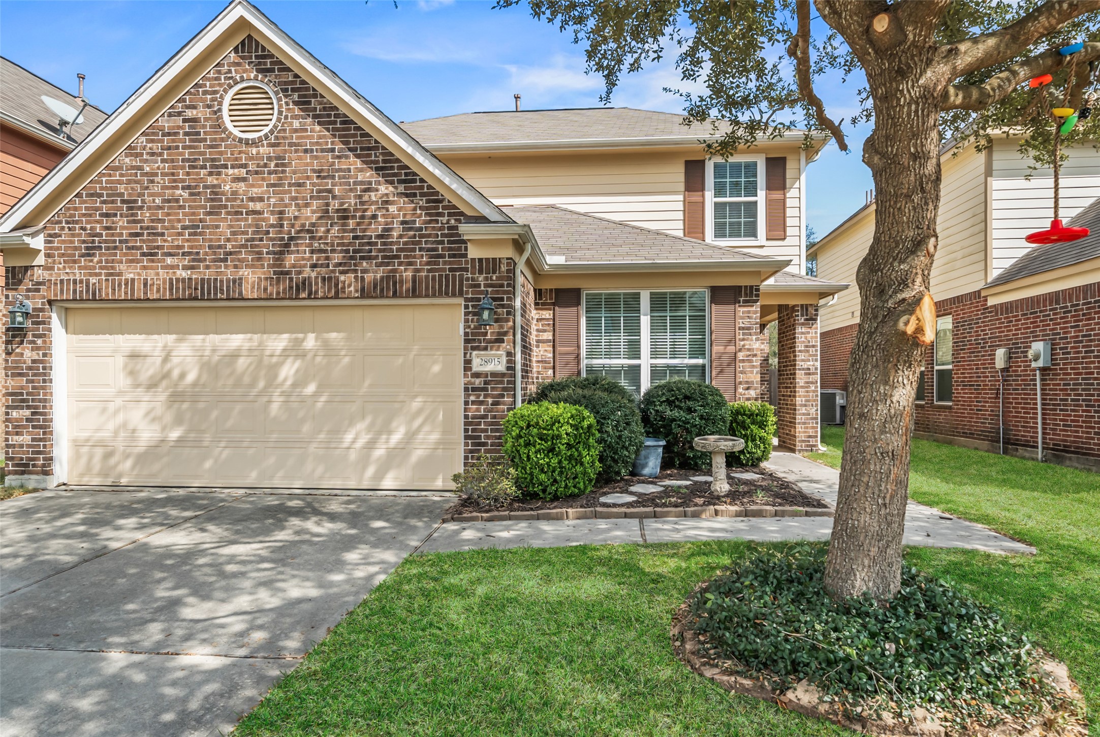 28915 Birch Green Way Spring, TX 77386 - Photo 2 of 30 a front view of a house with a yard