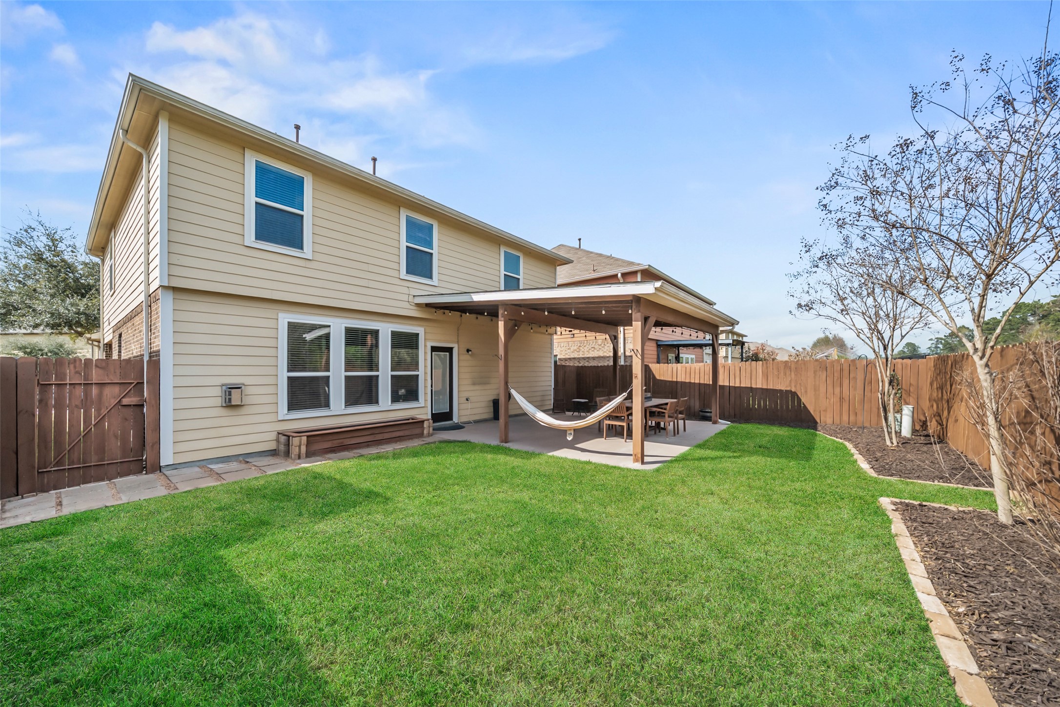 28915 Birch Green Way Spring, TX 77386 - Photo 26 of 30 a white house that has garden in front of it