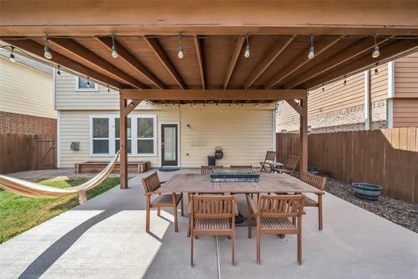 a table and chairs in patio