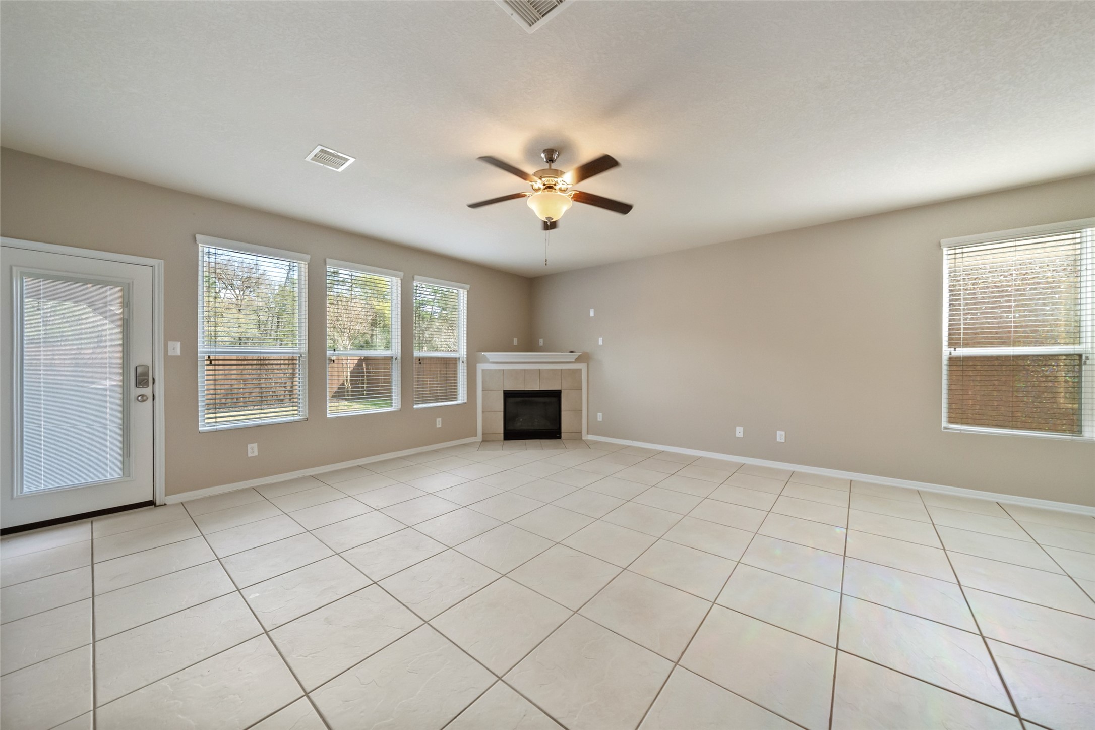 28915 Birch Green Way Spring, TX 77386 - Photo 5 of 30 a view of an empty room with a window