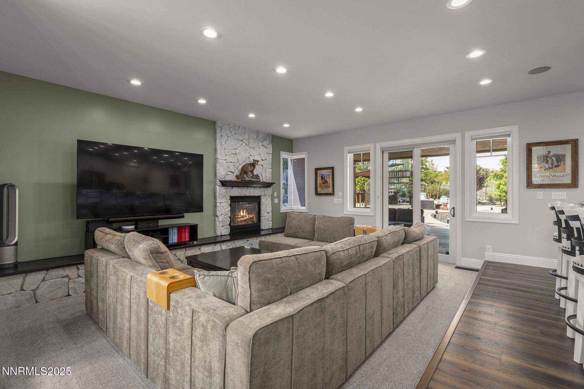 1465 Taos Lane Reno, NV 89511 - Photo 11 of 60 a living room with furniture and a flat screen tv