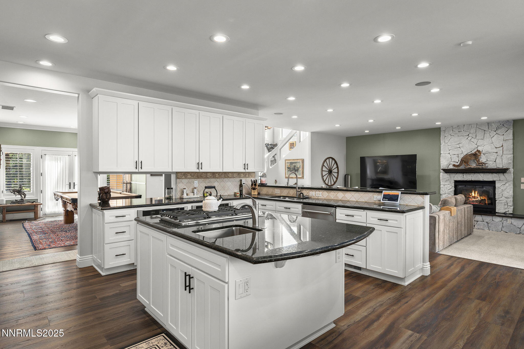 1465 Taos Lane Reno, NV 89511 - Photo 15 of 60 a kitchen with a sink stove top oven and refrigerator