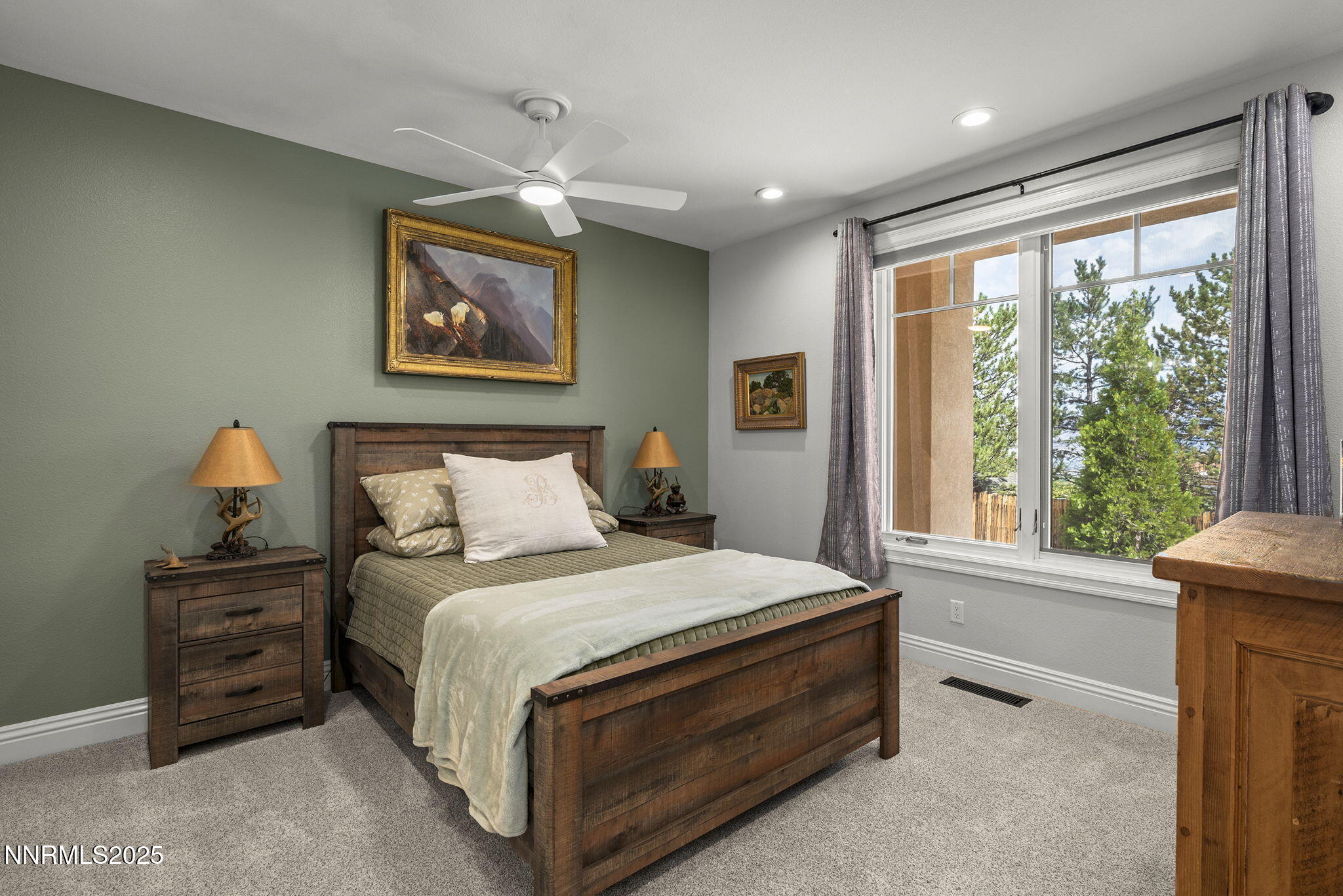 1465 Taos Lane Reno, NV 89511 - Photo 22 of 60 a bedroom with a bed and a window