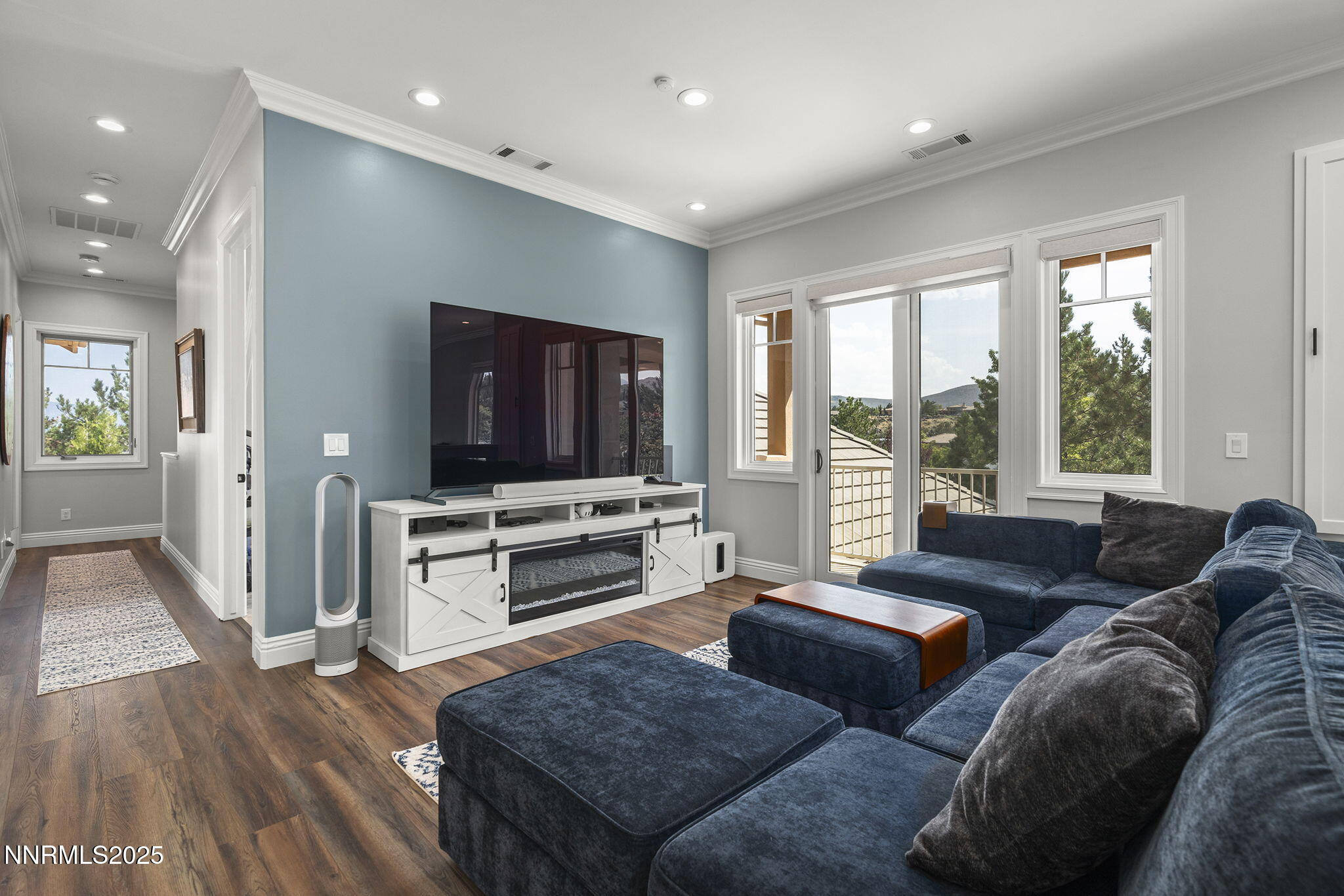 1465 Taos Lane Reno, NV 89511 - Photo 32 of 60 a living room with furniture and a flat screen tv