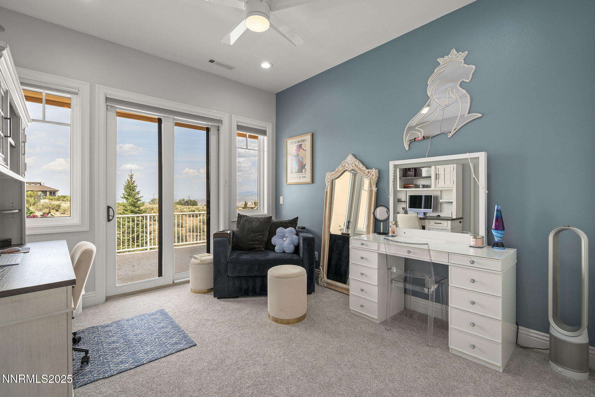 1465 Taos Lane Reno, NV 89511 - Photo 34 of 60 a living room with furniture and a flat screen tv