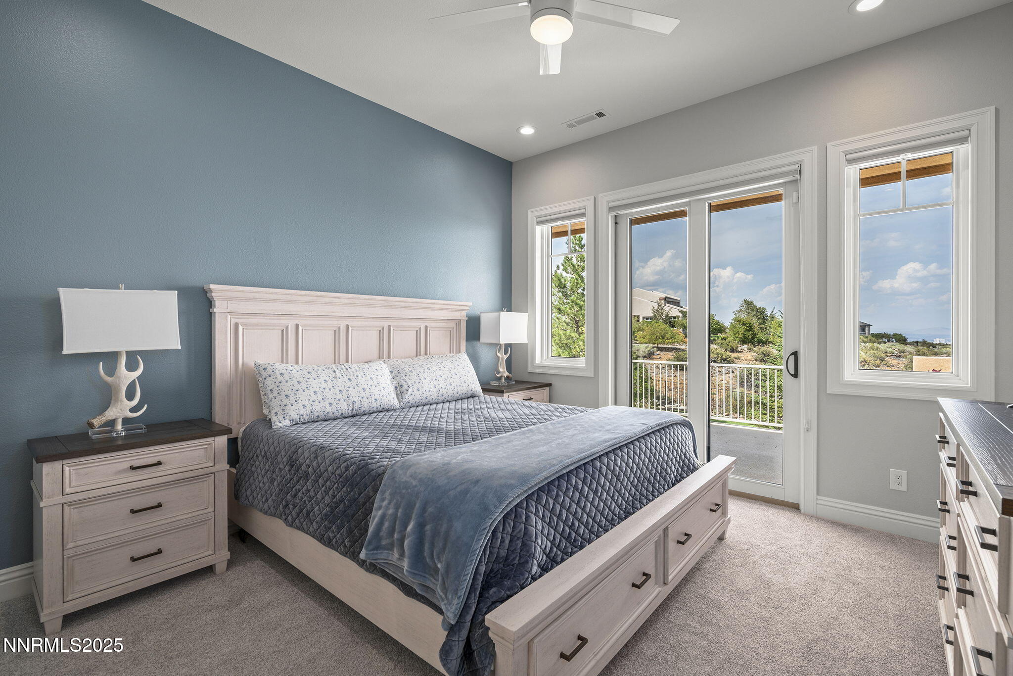 1465 Taos Lane Reno, NV 89511 - Photo 36 of 60 a bedroom with a bed and a window