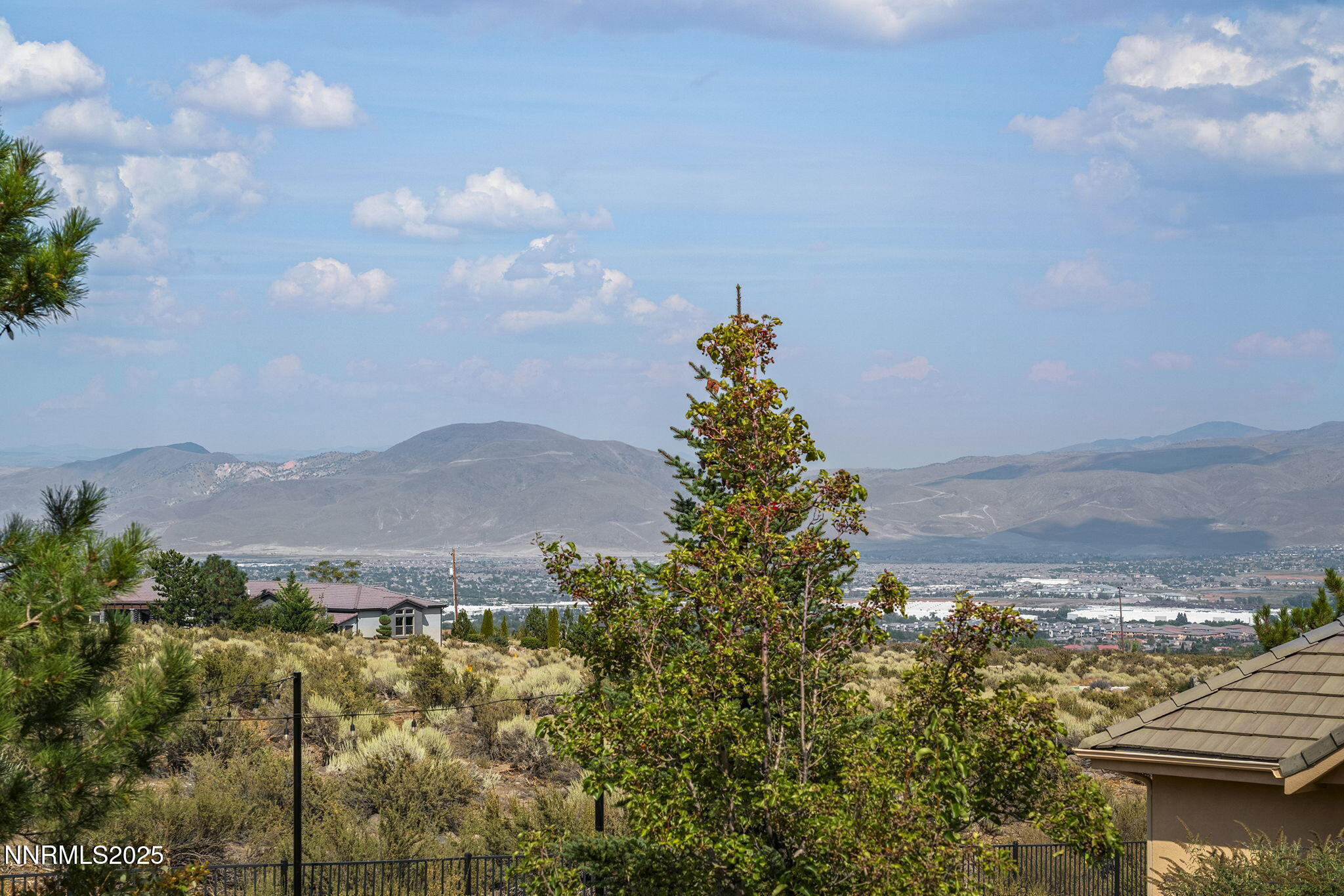 1465 Taos Lane Reno, NV 89511 - Photo 42 of 60 a view of a lake with a mountain in the background