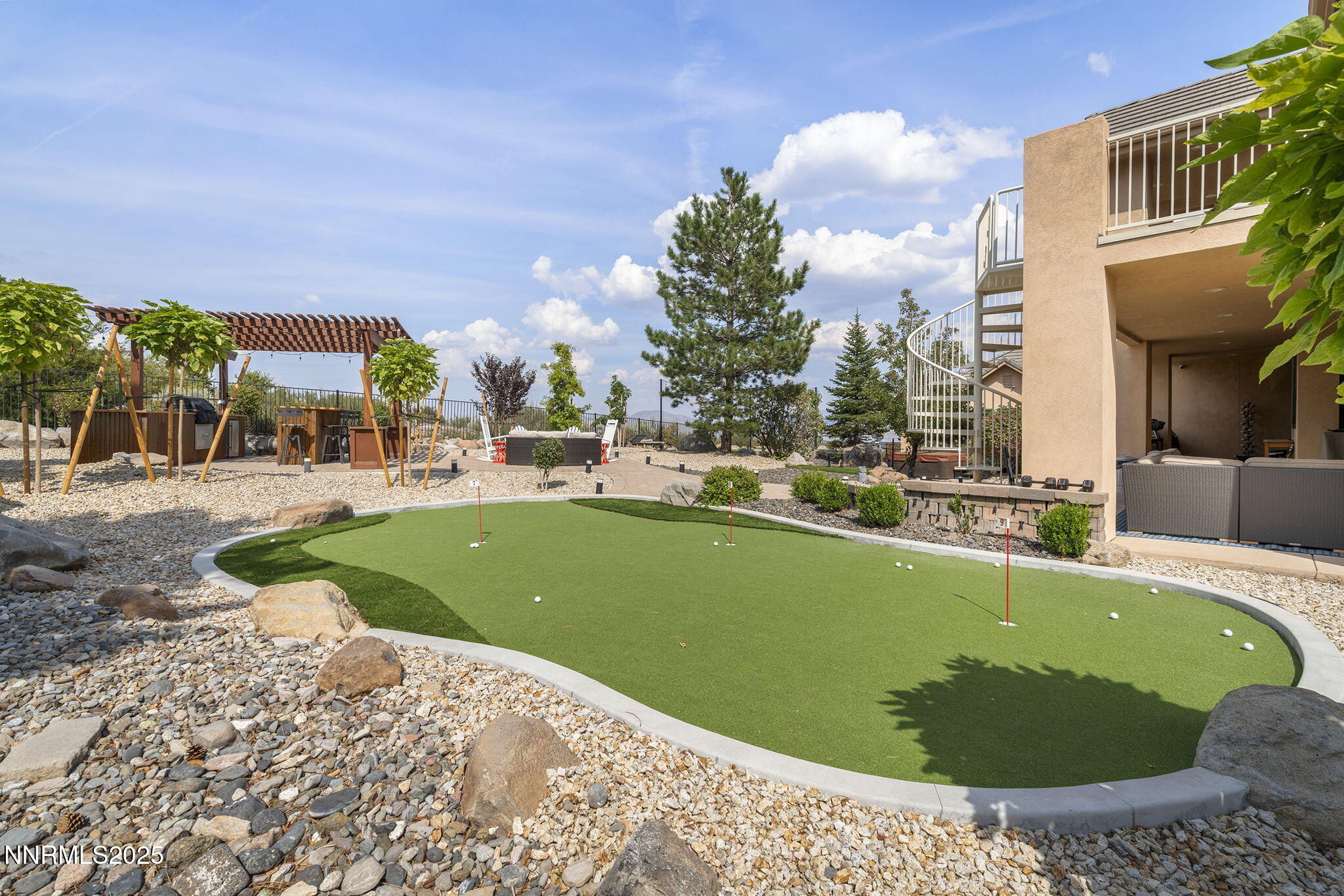 1465 Taos Lane Reno, NV 89511 - Photo 47 of 60 a view of a swimming pool with a patio