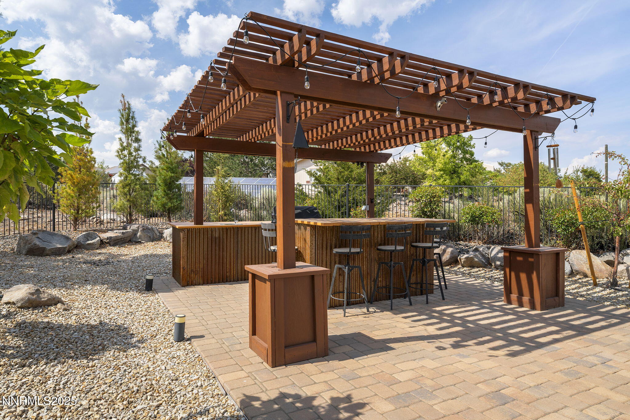 1465 Taos Lane Reno, NV 89511 - Photo 49 of 60 a view of a chairs and table in the patio