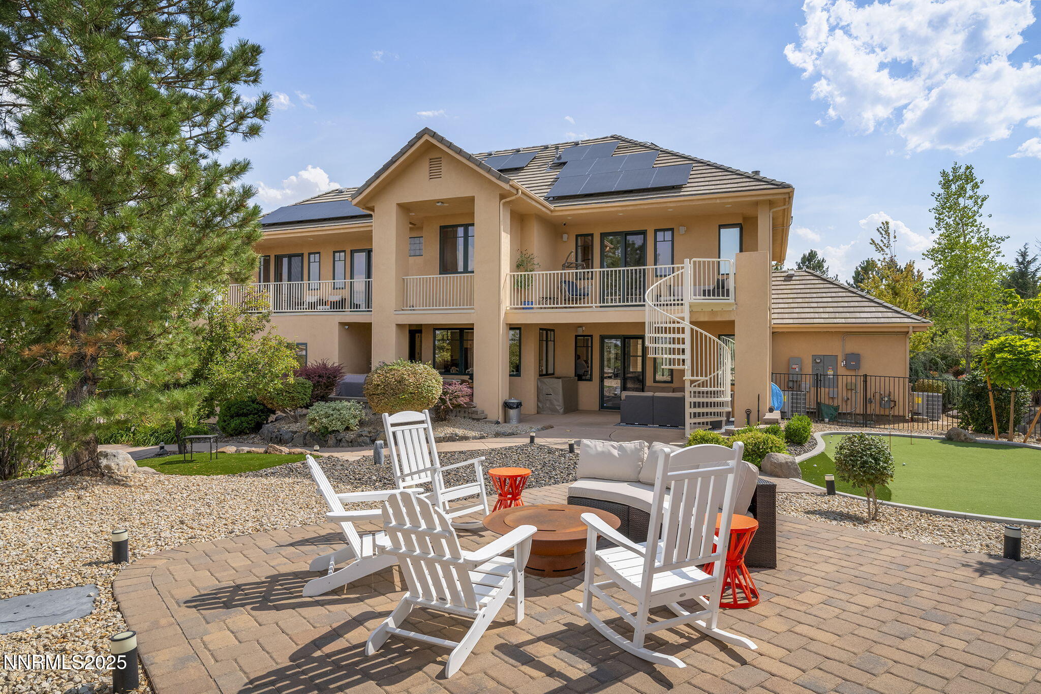 1465 Taos Lane Reno, NV 89511 - Photo 50 of 60 a view of a house with a yard patio and fire pit