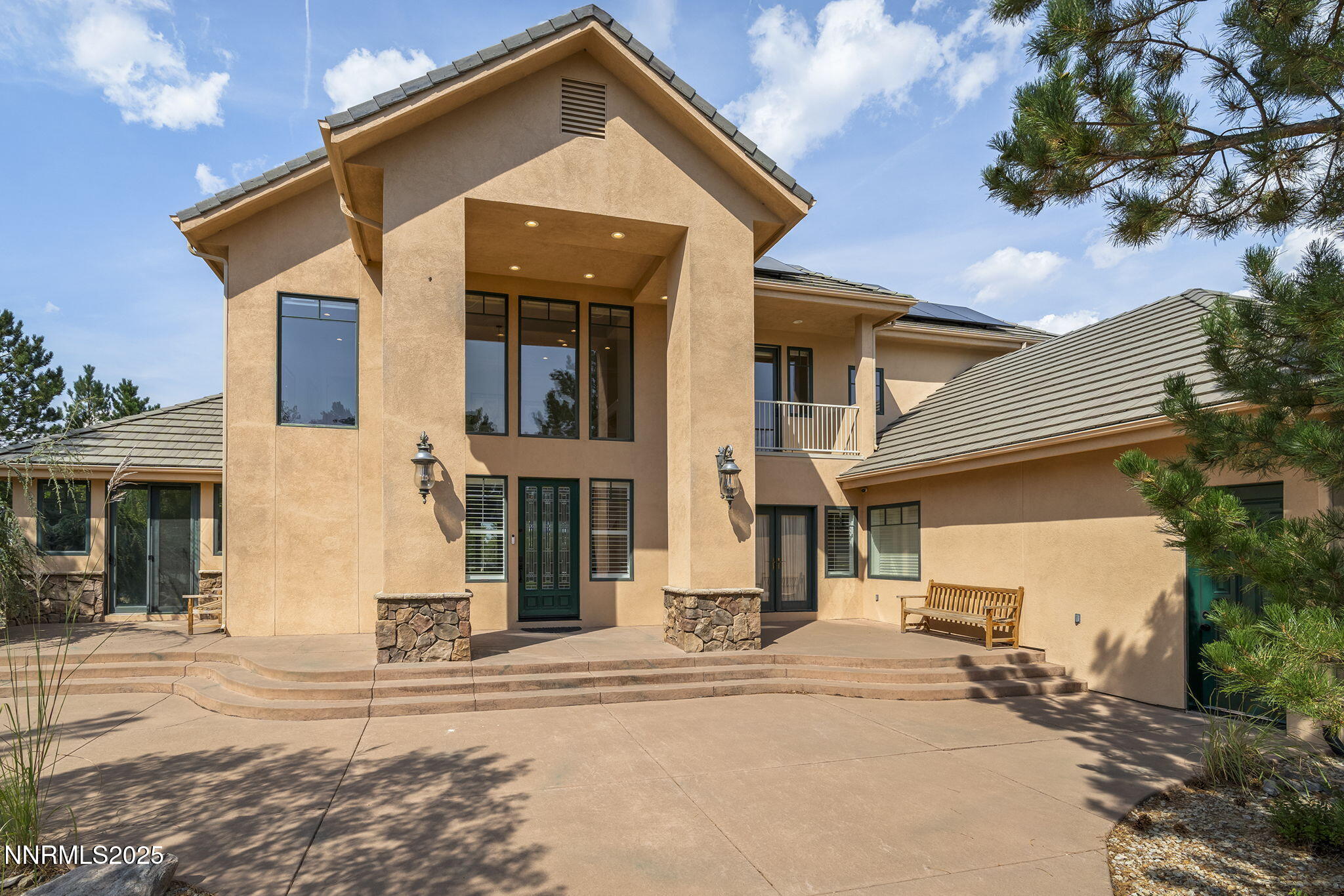 1465 Taos Lane Reno, NV 89511 - Photo 5 of 60 a front view of a house with a yard