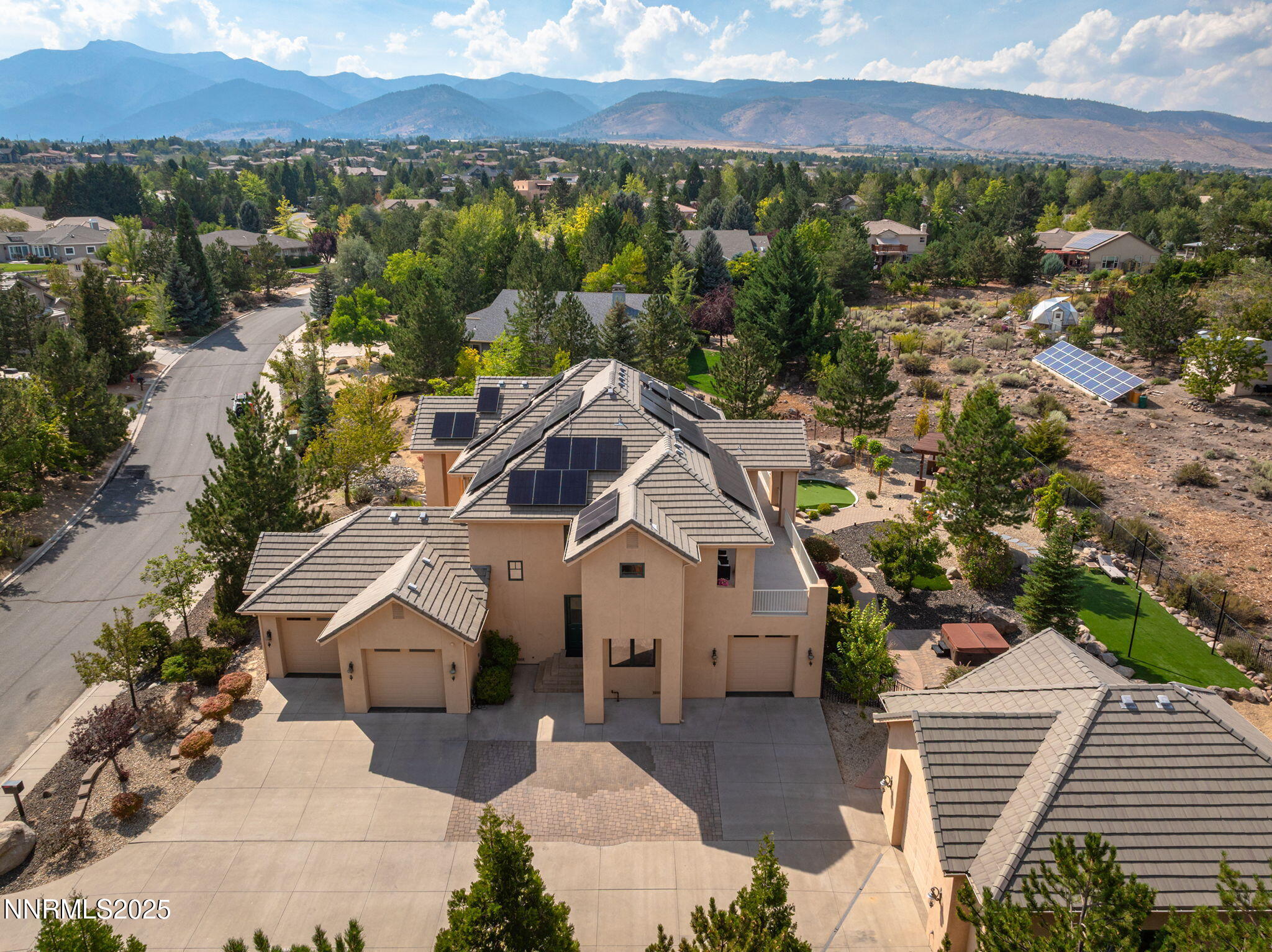 1465 Taos Lane Reno, NV 89511 - Photo 58 of 60 an aerial view of a house with a yard