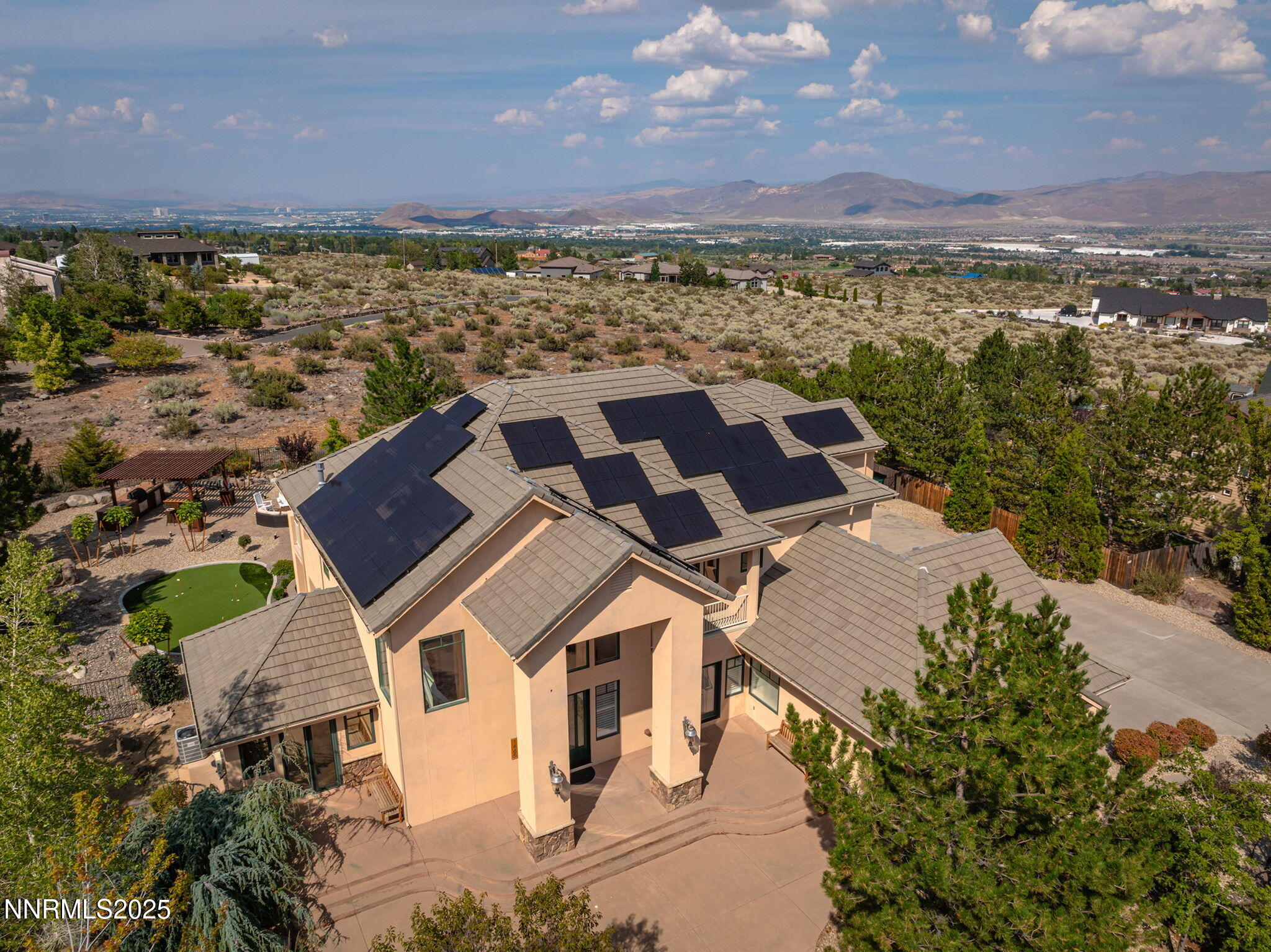 1465 Taos Lane Reno, NV 89511 - Photo 7 of 60 an aerial view of a house with a yard