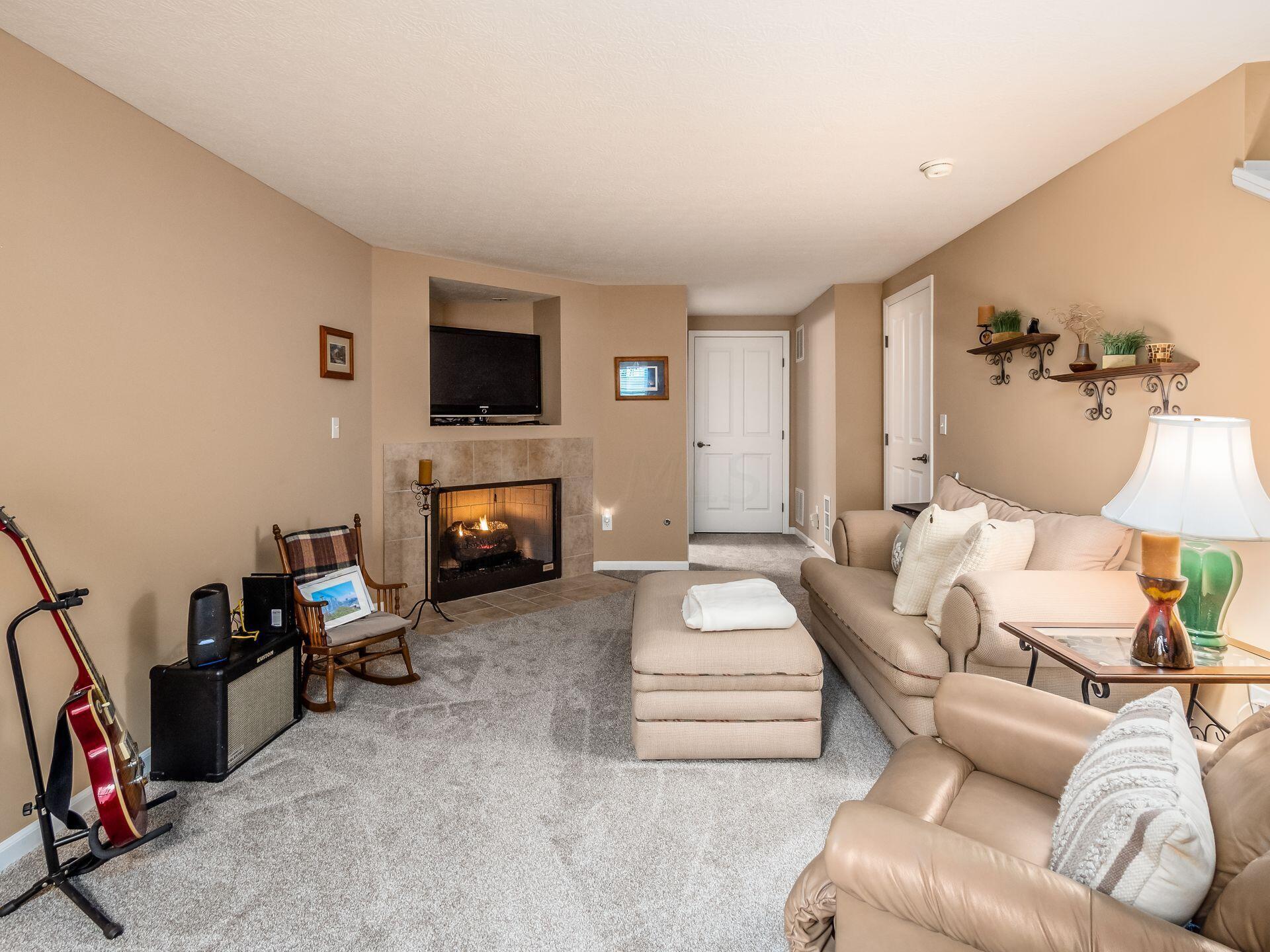 8302 Bruntsfield Road Columbus, OH 43235 - Photo 24 of 40 lower level family room/den