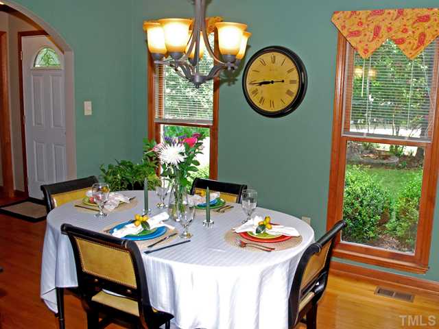 8705 Yucca Trail Raleigh, NC 27615 - Photo 4 of 19 Formal Dining w/ Arched Doorway & Hardoods!