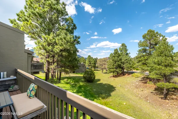 a view of a two chair in the balcony