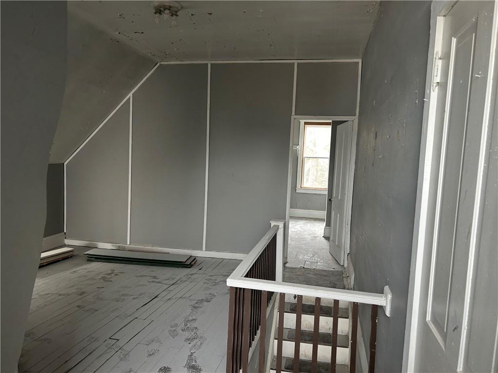 210 South Spring Street Blairsville, PA 15717 - Photo 4 of 15 a view of a room with wooden floor and a window