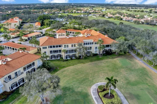 an aerial view of a house with a garden
