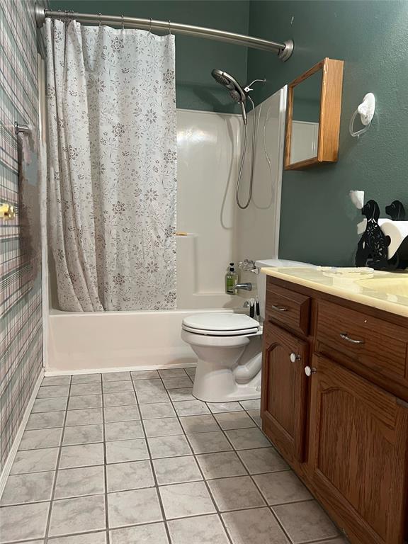 8505 County Road 500 Blue Ridge, TX 75424 - Photo 27 of 39 a bathroom with a sink a toilet and shower