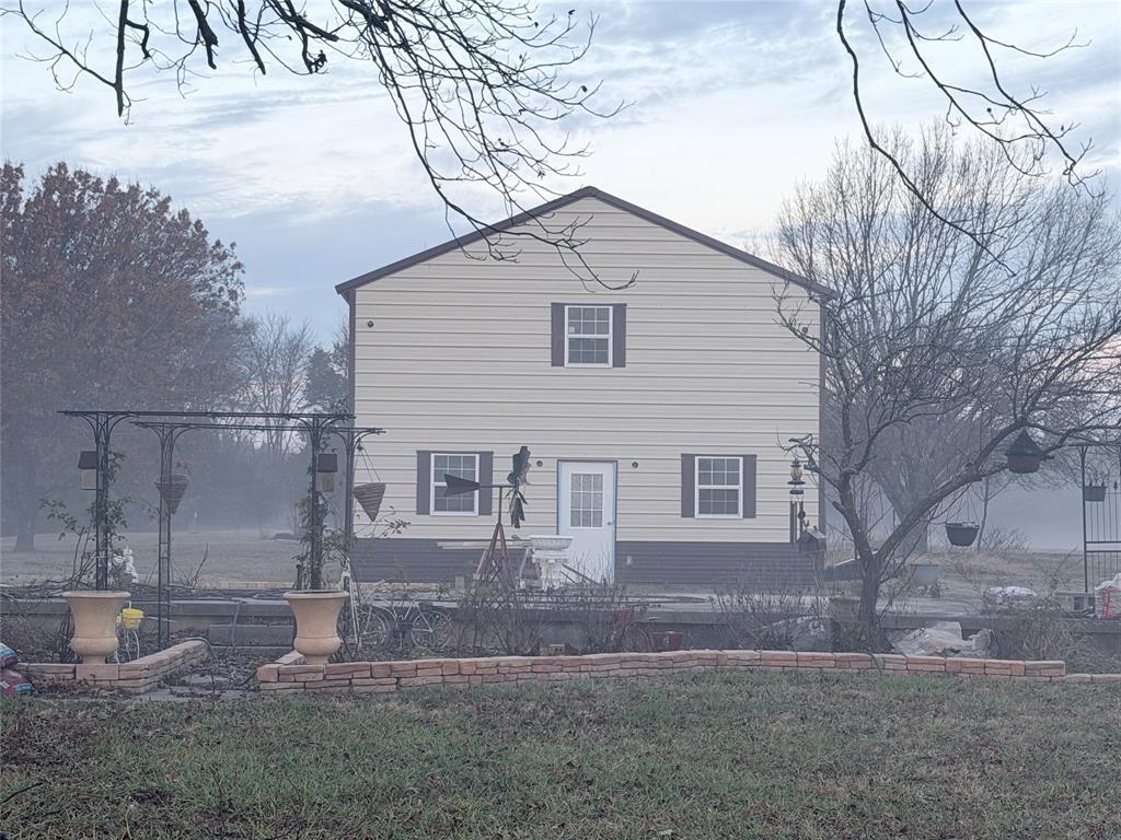 8505 County Road 500 Blue Ridge, TX 75424 - Photo 29 of 39 a view of a house with a yard
