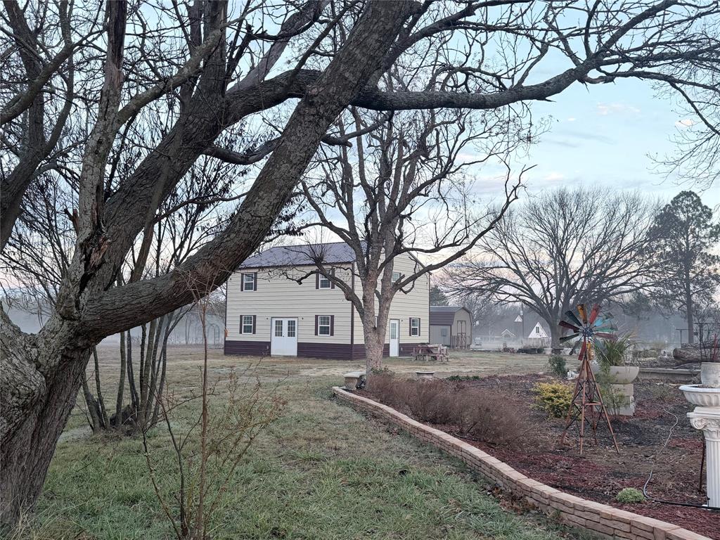 8505 County Road 500 Blue Ridge, TX 75424 - Photo 30 of 39 a view of white house with a snow on the side