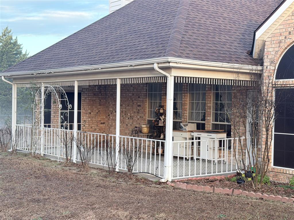 8505 County Road 500 Blue Ridge, TX 75424 - Photo 3 of 39 a view of a house with a porch