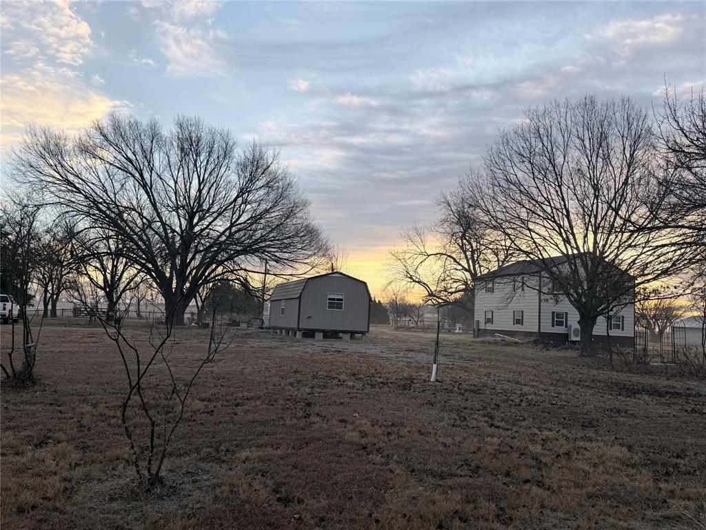 8505 County Road 500 Blue Ridge, TX 75424 - Photo 35 of 39 a view of yard covered with snow in front of house