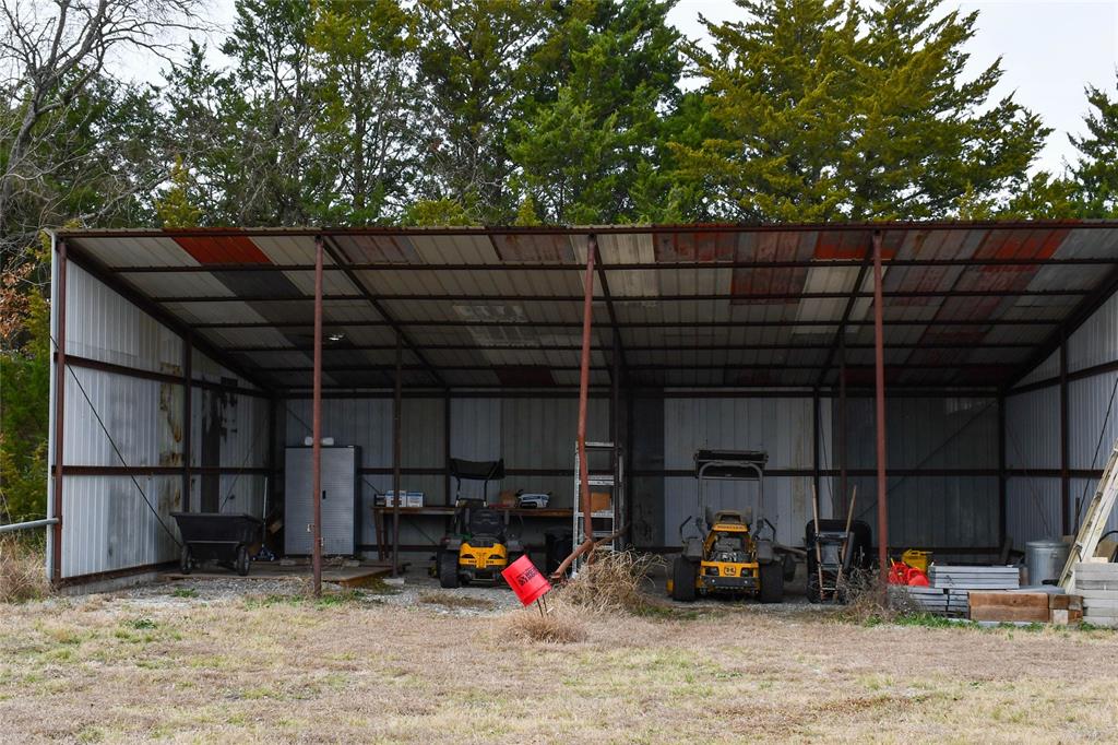8505 County Road 500 Blue Ridge, TX 75424 - Photo 37 of 39 a view of parking garage with cars