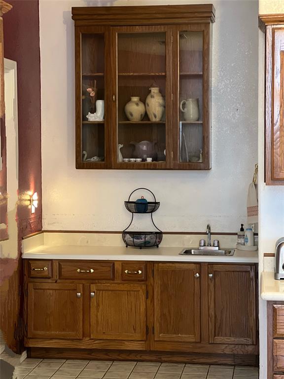 8505 County Road 500 Blue Ridge, TX 75424 - Photo 9 of 39 a kitchen with granite countertop a sink and cabinets