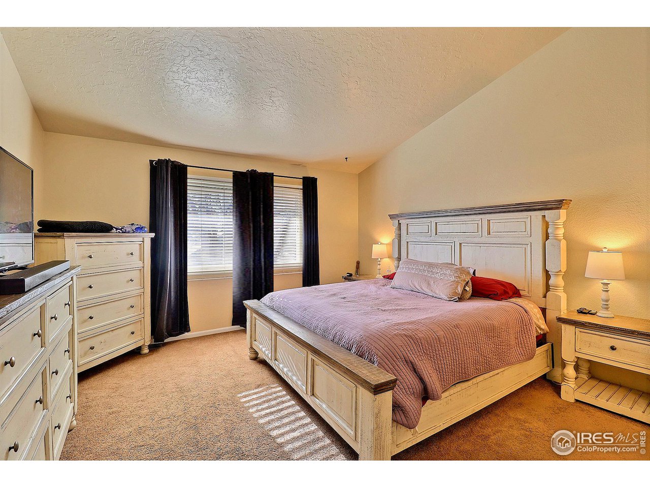 4924 10th Street Road Greeley, CO 80634 - Photo 15 of 24 Primary Bedroom