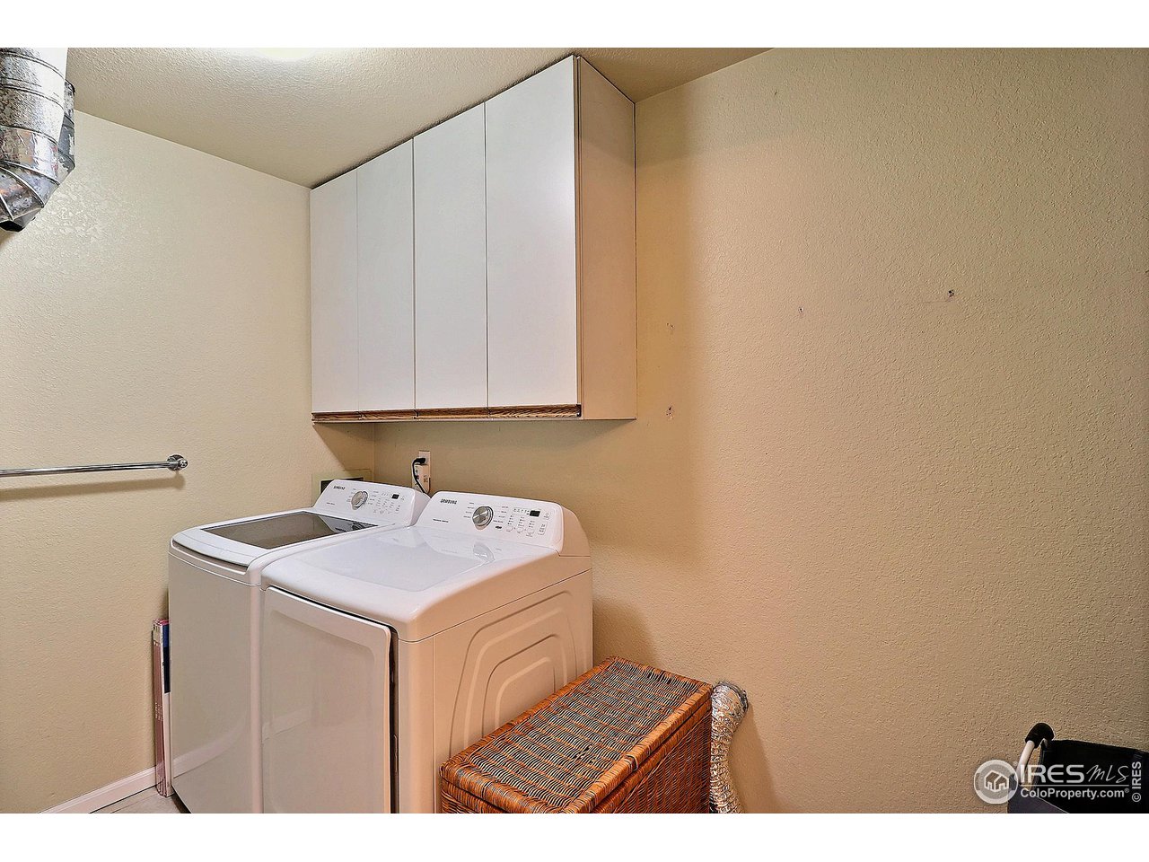 4924 10th Street Road Greeley, CO 80634 - Photo 21 of 24 Main Level Laundry Room